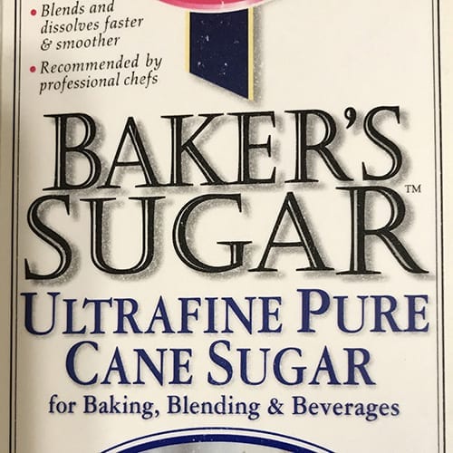 A box of sugar that is labeled " baker 's sugar ".