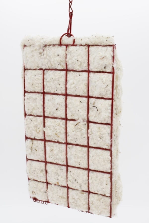 A piece of rice cake with red lines on it.