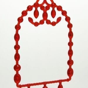 A red plastic frame with a large beaded design.