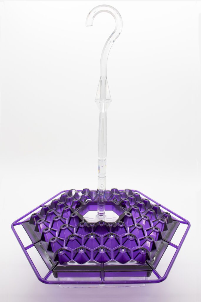 A purple plastic basket with a handle on top.